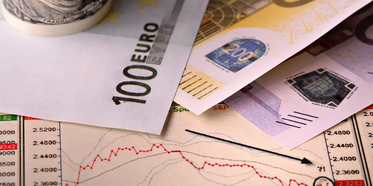 Euro banknoty 100 i 200 na wykresie giełdowym. Wypełniony pit-36 zg wzór.